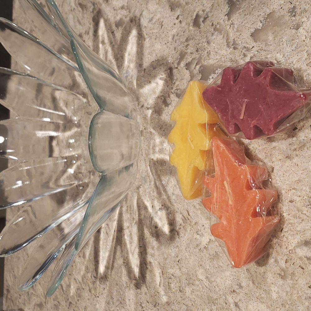 Glass Flower Shaped Bowl with floating candles.